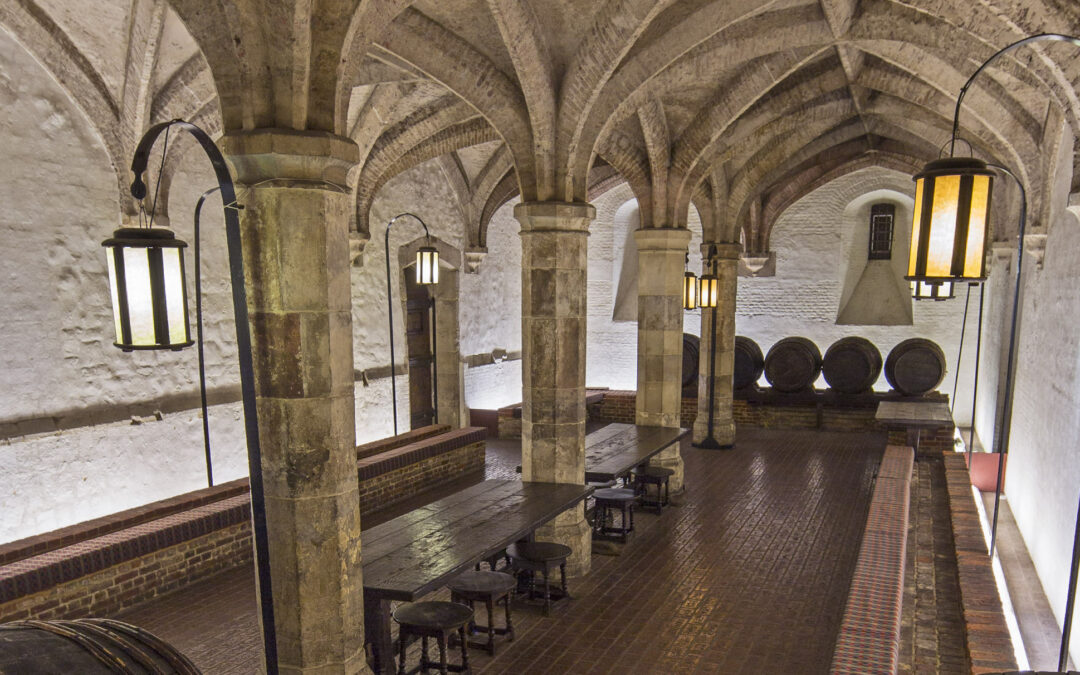 Ten journalists in a wine cellar with the defence secretary