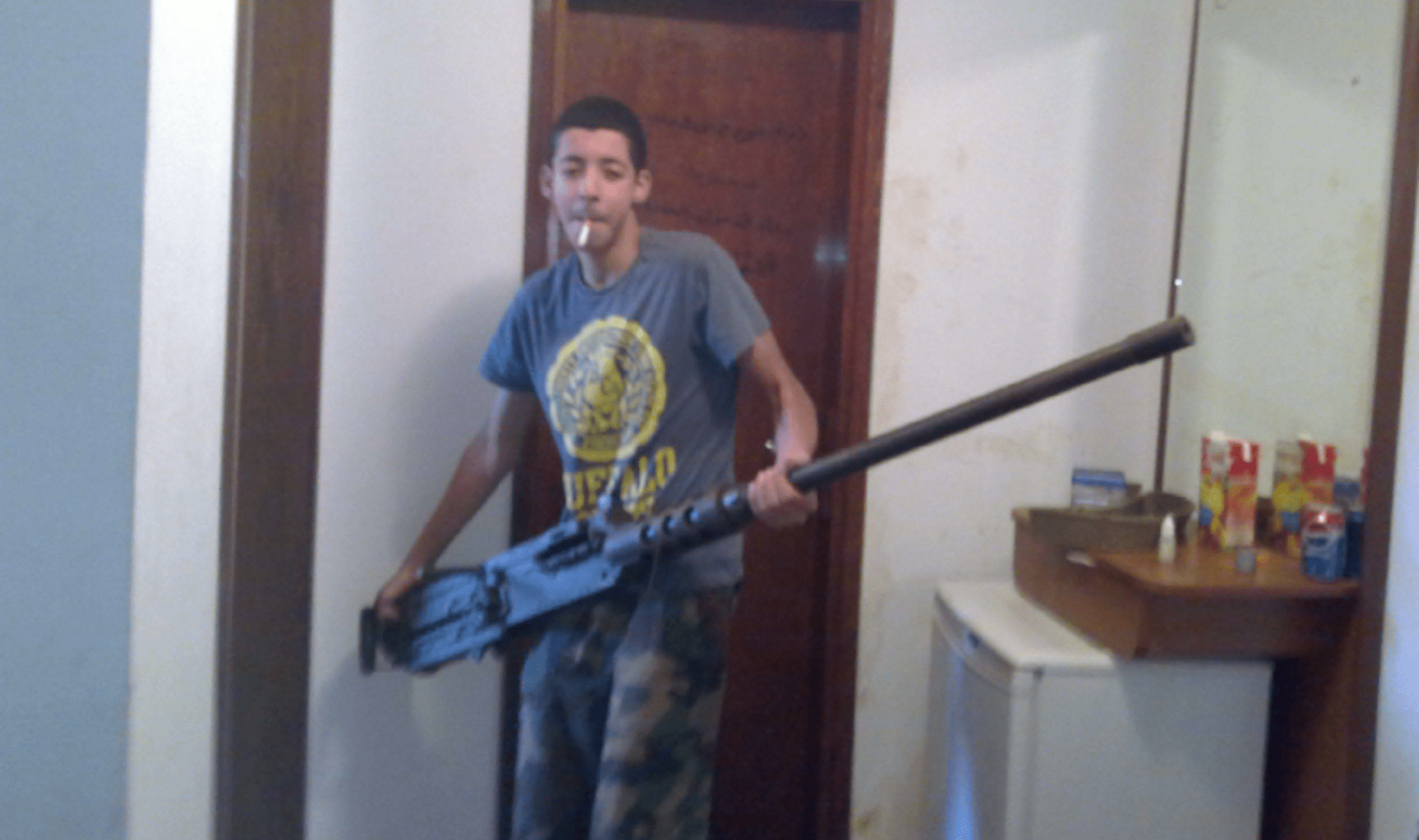 Salman Abedi holding heavy gun.