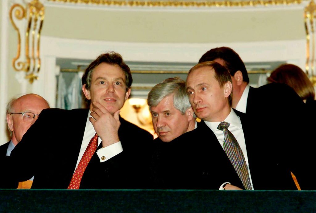 Then British prime minister Tony Blair and acting Russian president Vladimir Putin at a theatre performance in St Petersburg, March 2000. (Photo: Oleg Nikishin / Getty)