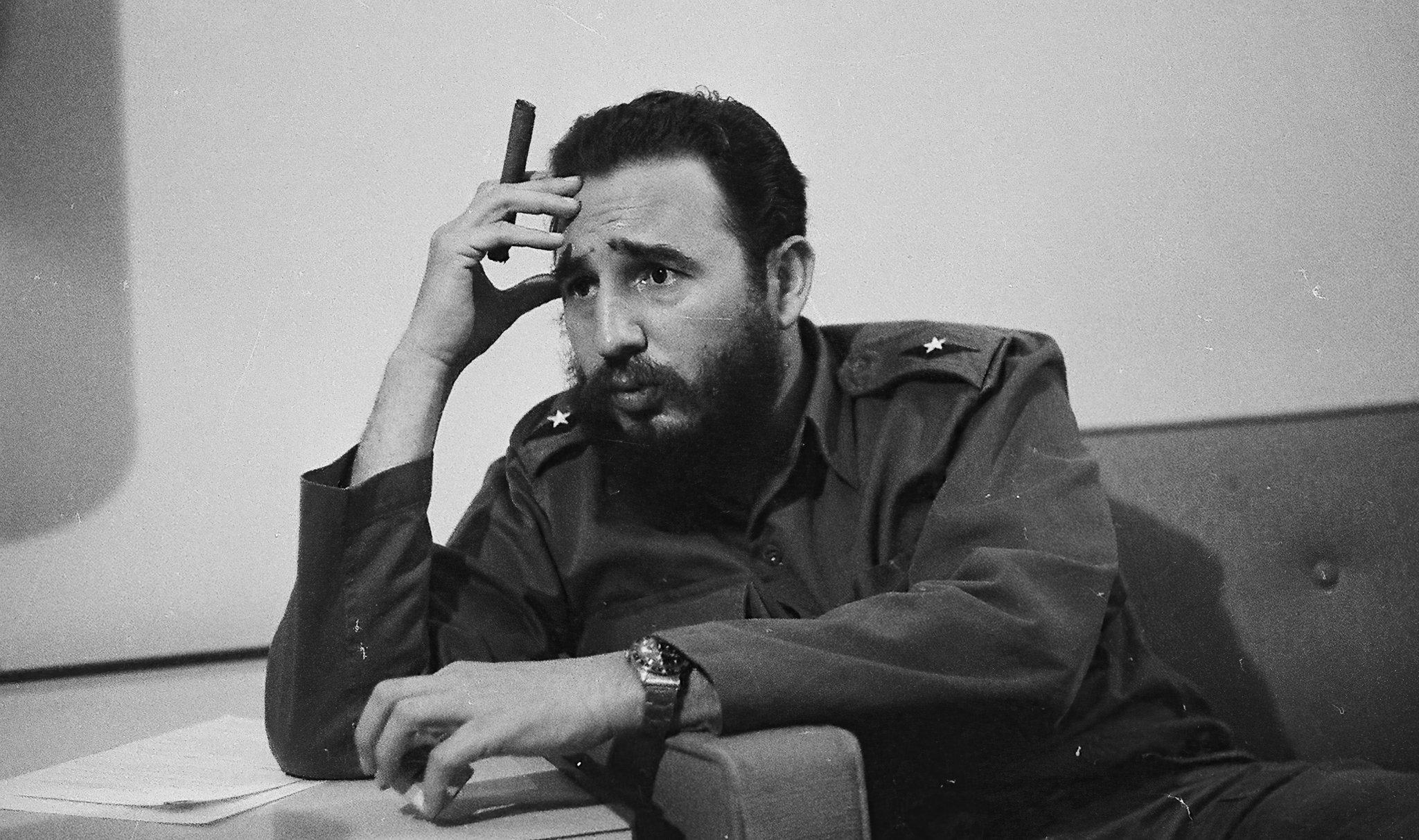 Fidel Castro smoking a cigar in 1963. (Photo: Duke University Rubenstein Library / Gado / Getty)