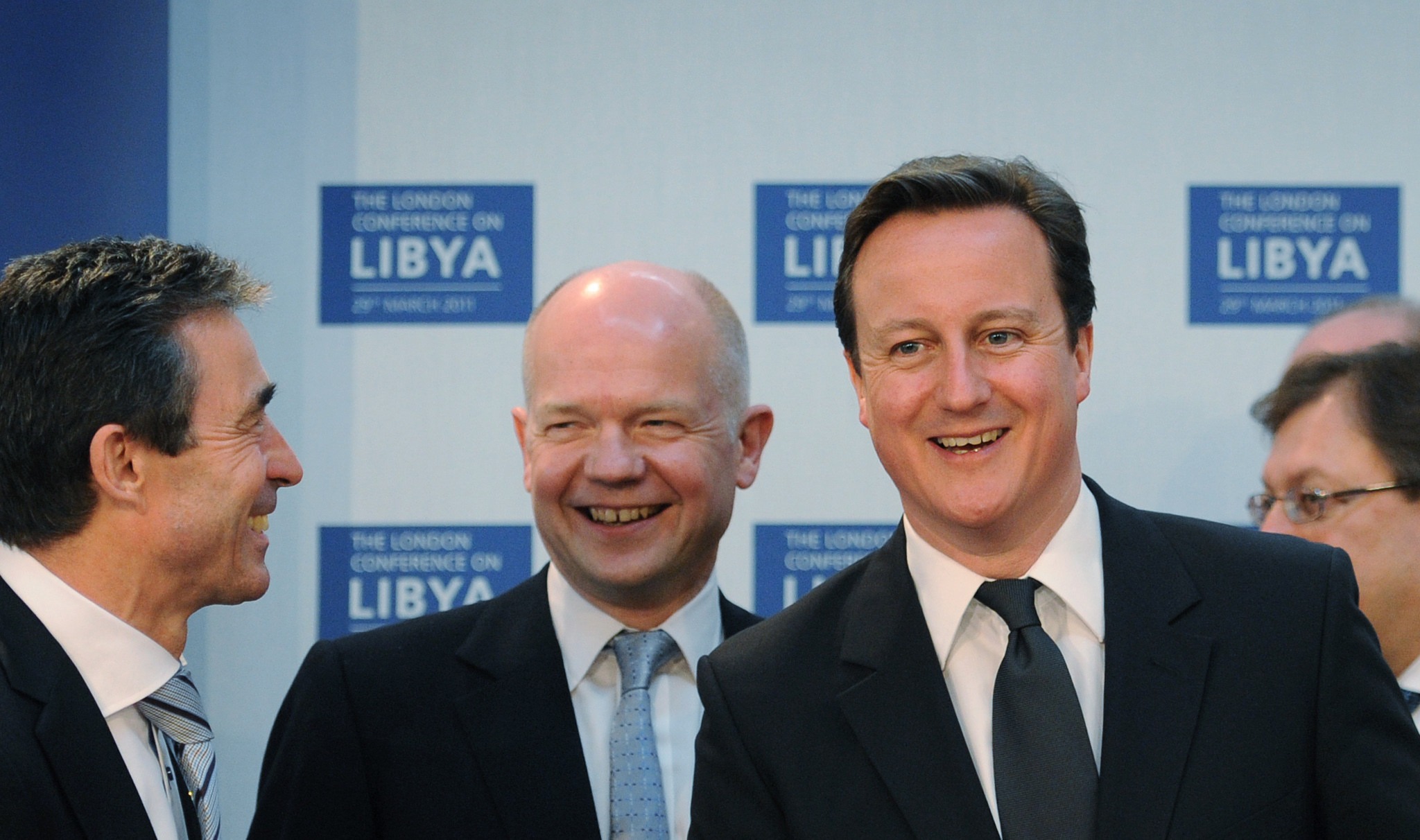 NATO Secretary General Anders Fogh Rasmussen with British British foreign secretary William Hague and PM David Cameron at the Libya Conference in London, 2011. (Photo: Stefan Rousseau /WPA Pool/ Getty)