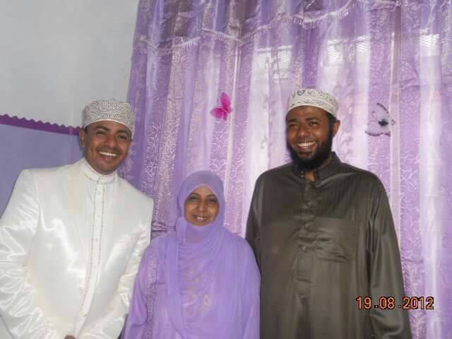 Omar Faraj (right) with his mother and brother, two months before he was murdered. (Photo: Saad Faraj)