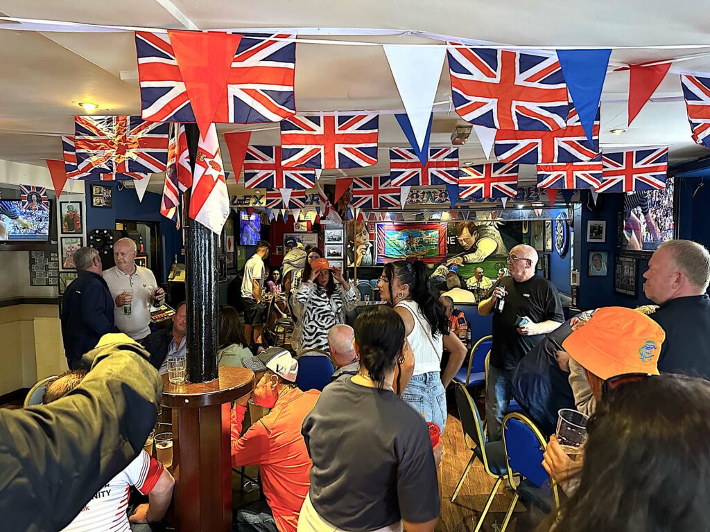 A protestant pub in west Belfast on the day of the Orange Order parade. (Photo: Matt Kennard/DCUK)