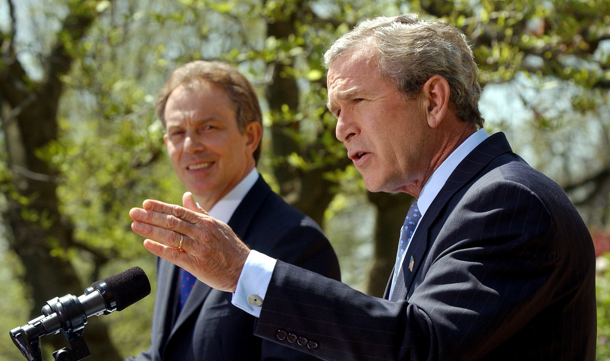 W0CBRK U.S. President George W. Bush, right, and British Prime Minister Tony Blair answer questions from the media during a news conference in the Rose Garden of the White House on April 16, 2004. The two leaders faced questions about the current situation in Iraq and the stalled peace process between the Palestinians and Israel. (UPI Photo/Roger L. Wollenberg)