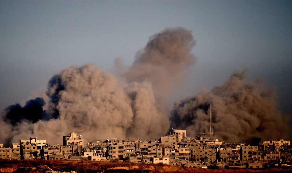 Smoke rises from an Israeli military strike on northern Gaza today. (Photo: Emilio Morenatti / Alamy)