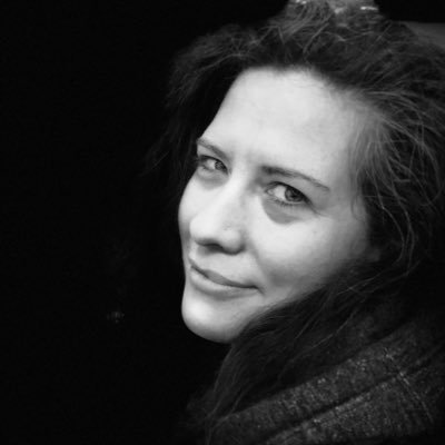 A headshot of Mark Curtis